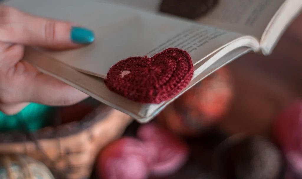 Heart-shaped crochet bookmark.